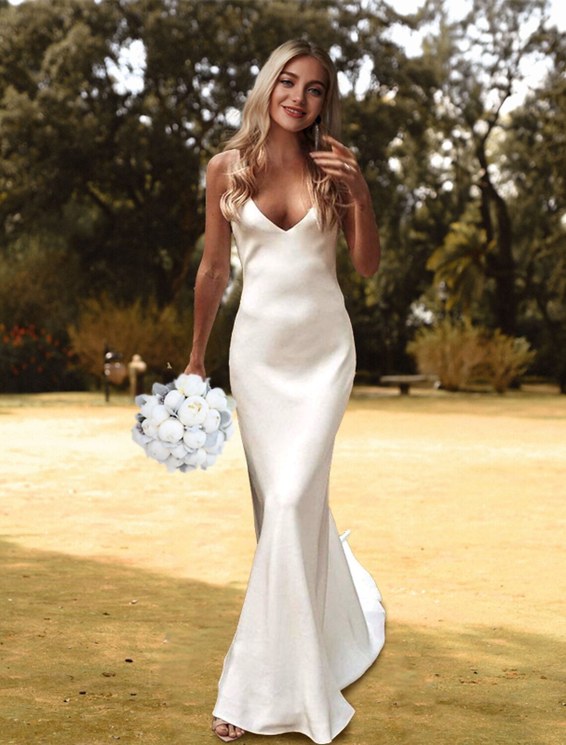 Front view of an elegant sheath V-neck wedding dress with spaghetti straps and court train.