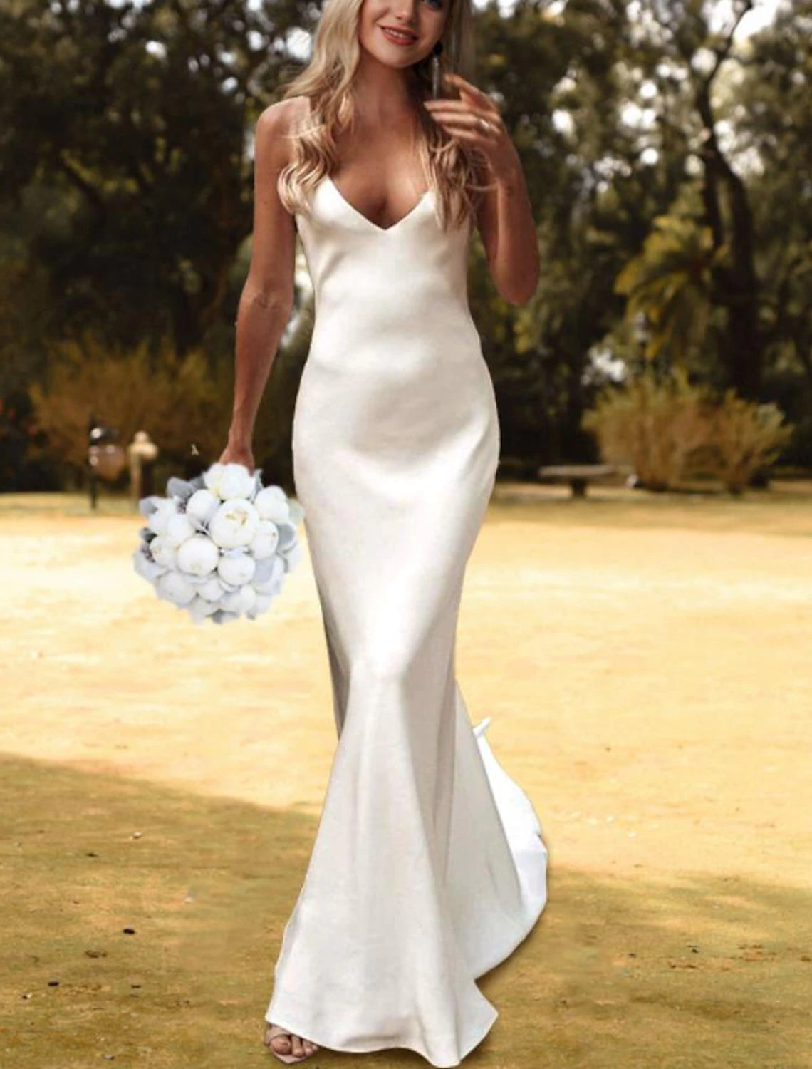 Side view of a casual V-neck bridal gown with spaghetti straps.