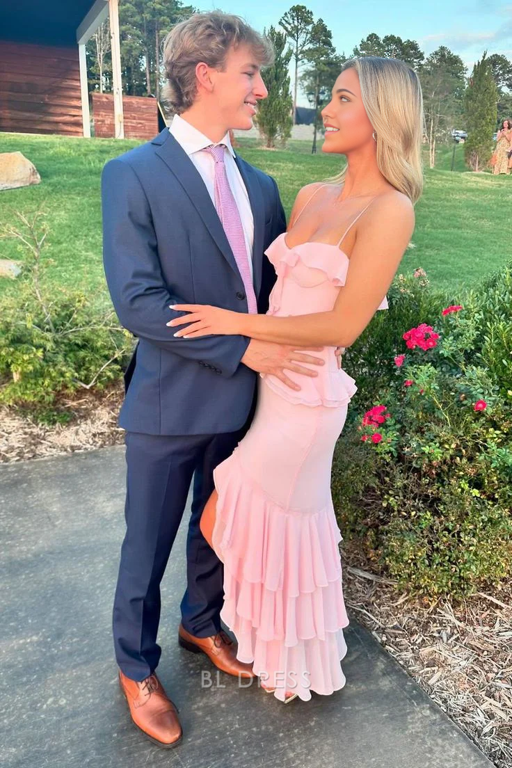 Pink sheath formal dress with spaghetti straps and V-neckline.