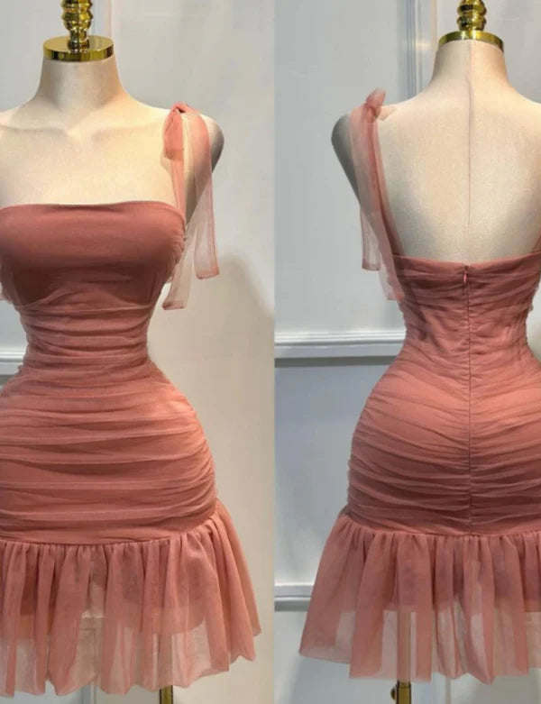 Red short sheath homecoming dress with spaghetti straps and tulle overlay.