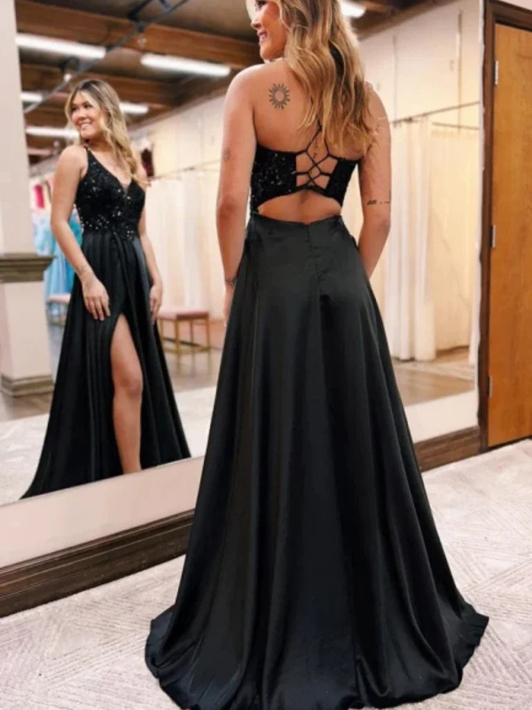 Back view of the sequin A-line prom dress highlighting the open back design.