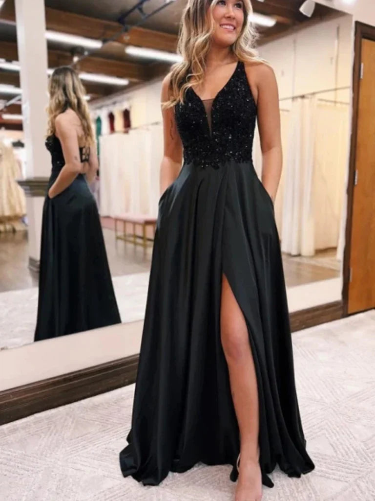 Front view of the sequin A-line prom dress showing the V-neck and high slit.