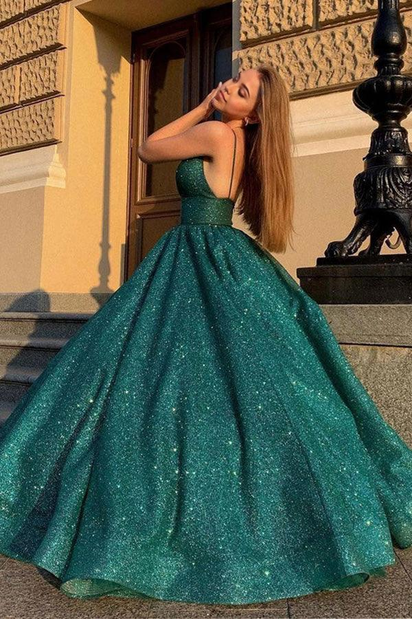 Full view of the green shiny A-line formal ball gown.