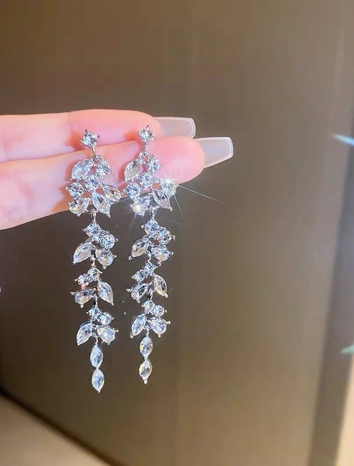 Elegant silver tassel fringe drop earring.