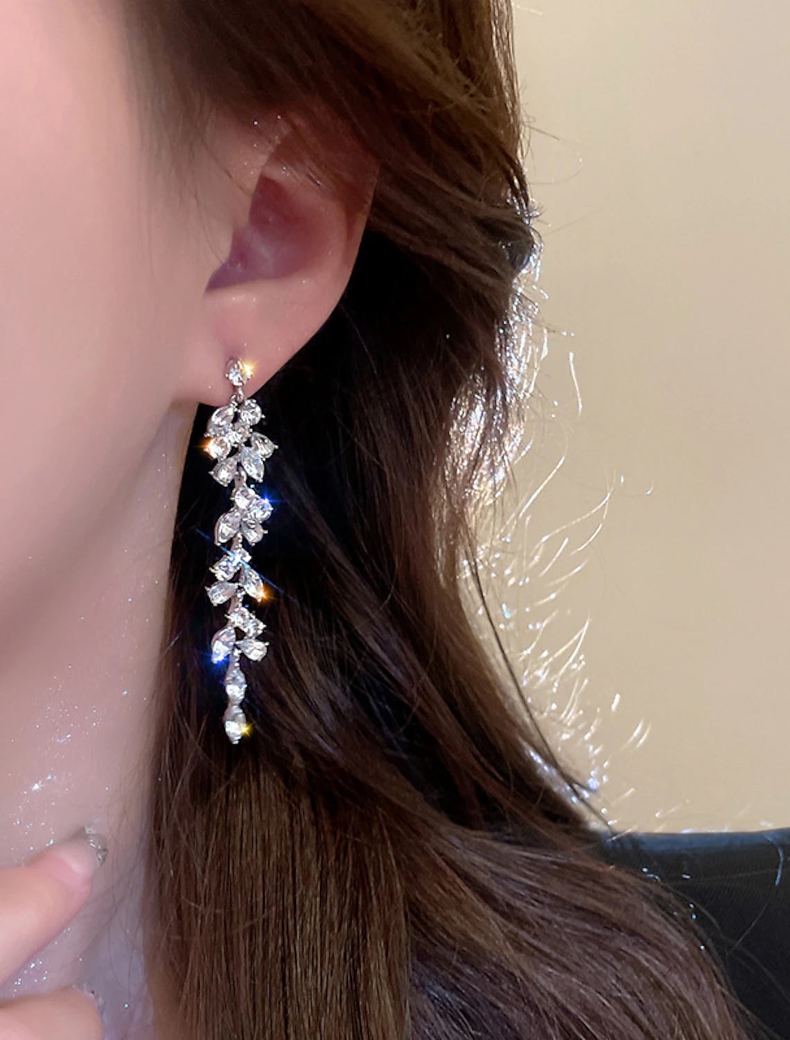 Back view of a silver tassel fringe drop earring.