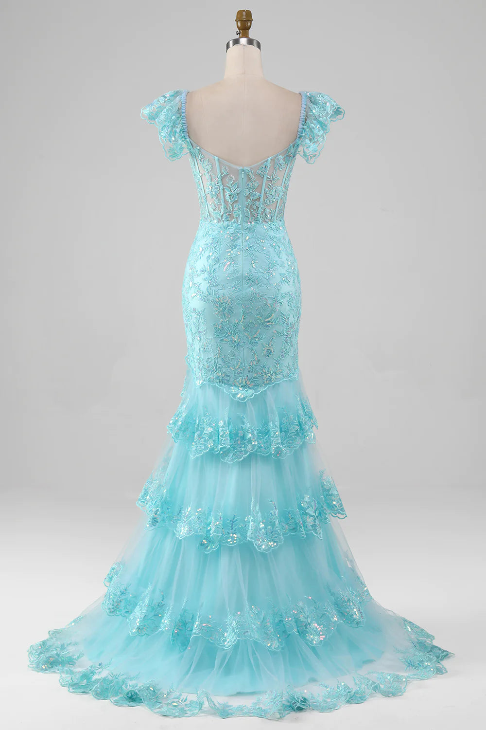 Side view of the sky blue mermaid trumpet gown, showcasing the court train and sequin details.