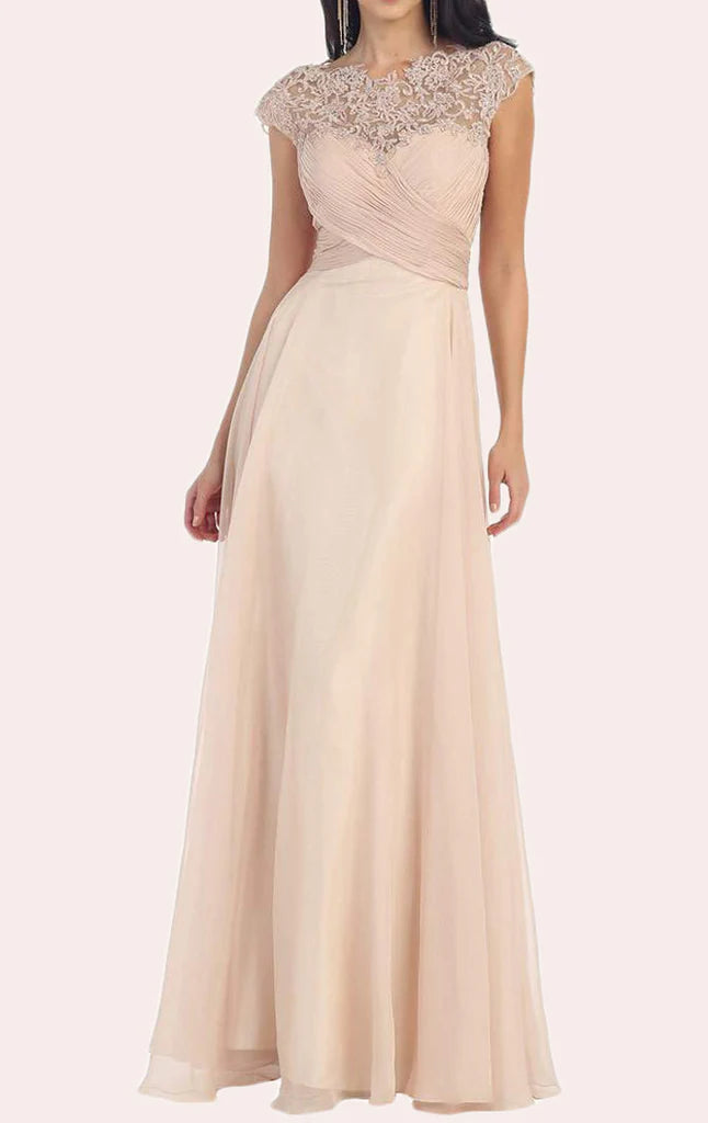 Woman wearing an elegant sleeveless lace and chiffon mother of the bride dress.