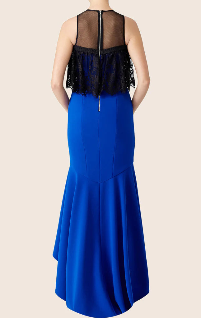 Close-up of lace and ruffled details on a high-low formal gown.