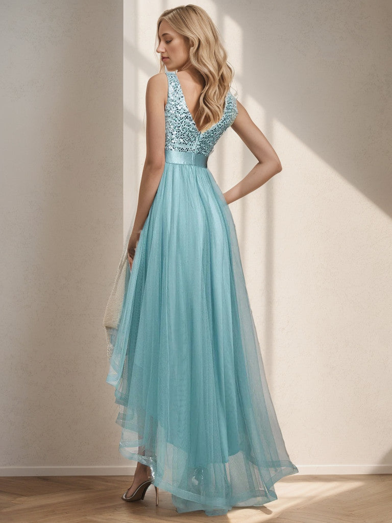 Back view of a sleeveless dusty blue sequin tulle high-low evening gown.