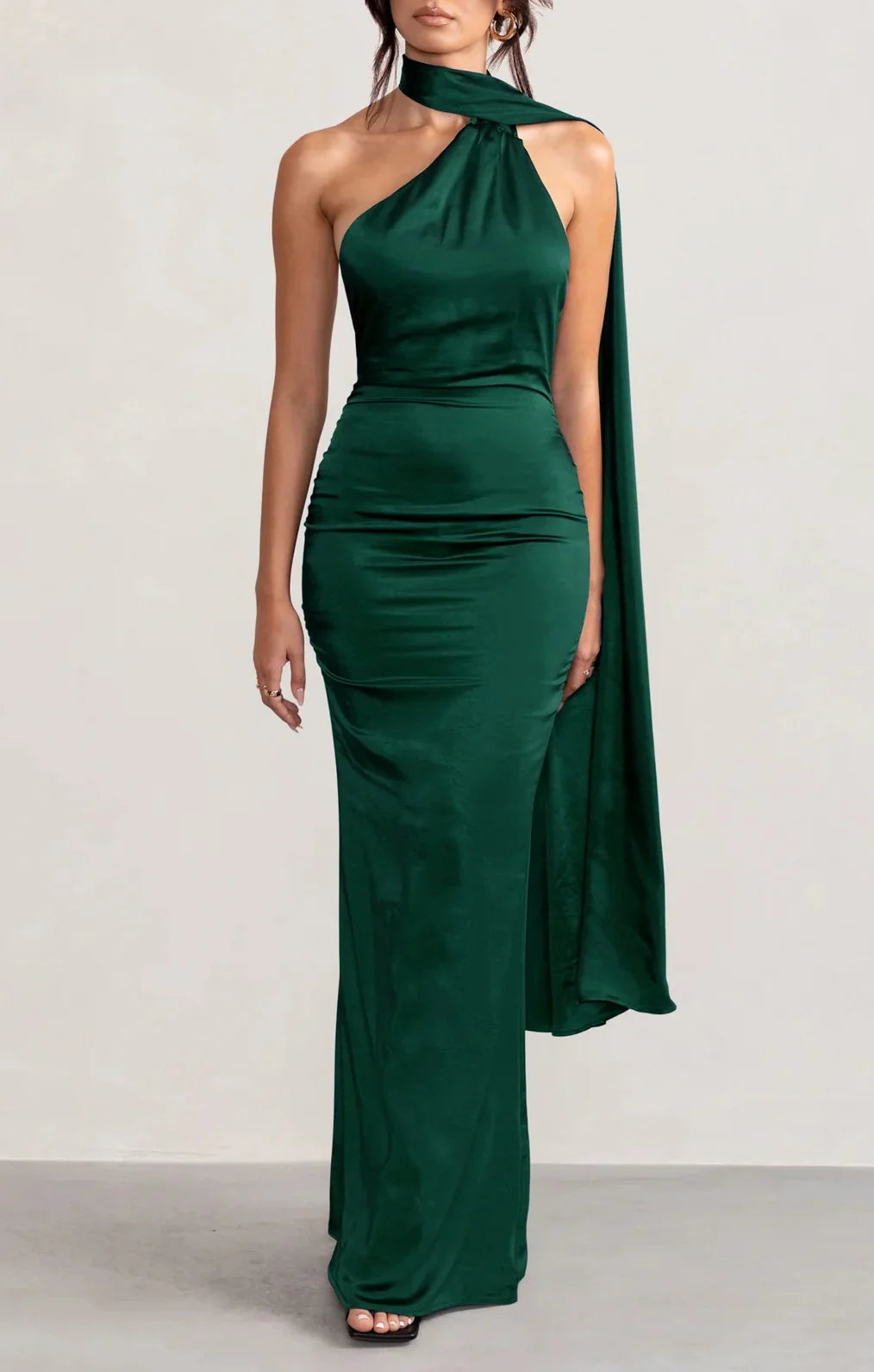 Woman wearing an elegant sleeveless sheath floor length prom dress.