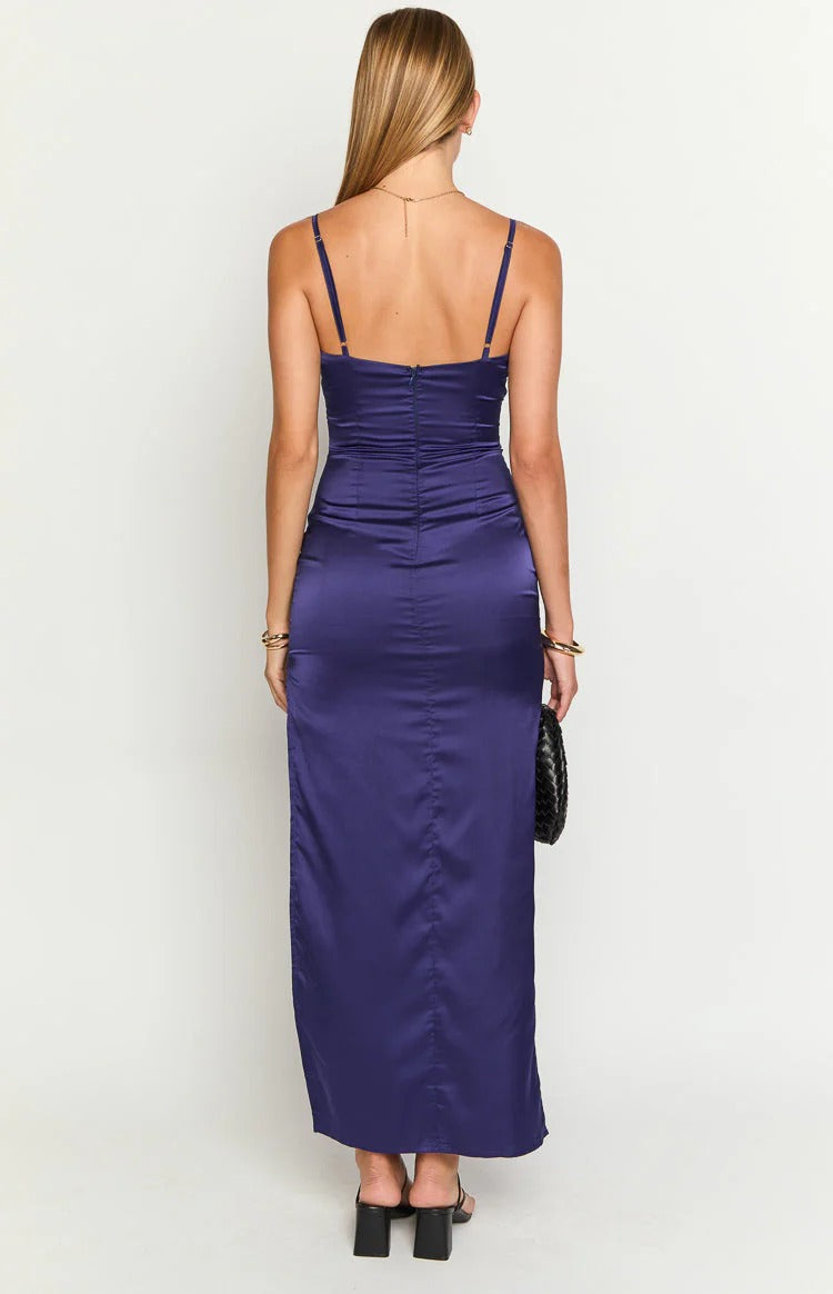 Side view of the satin slip dress, highlighting the high slit and form-fitting silhouette.