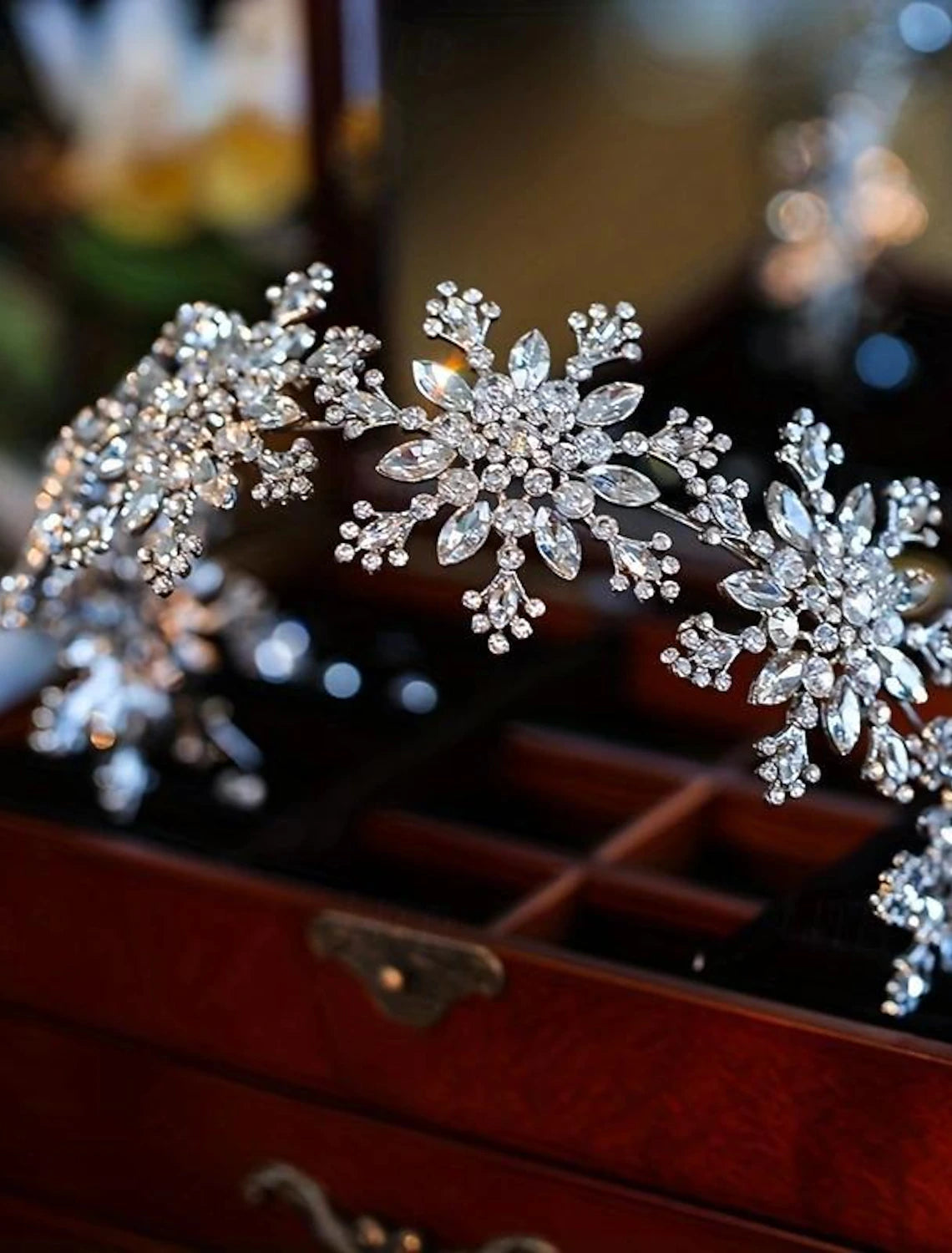 Close-up of the snowflake headband, highlighting the detailed craftsmanship and shimmering elements.
