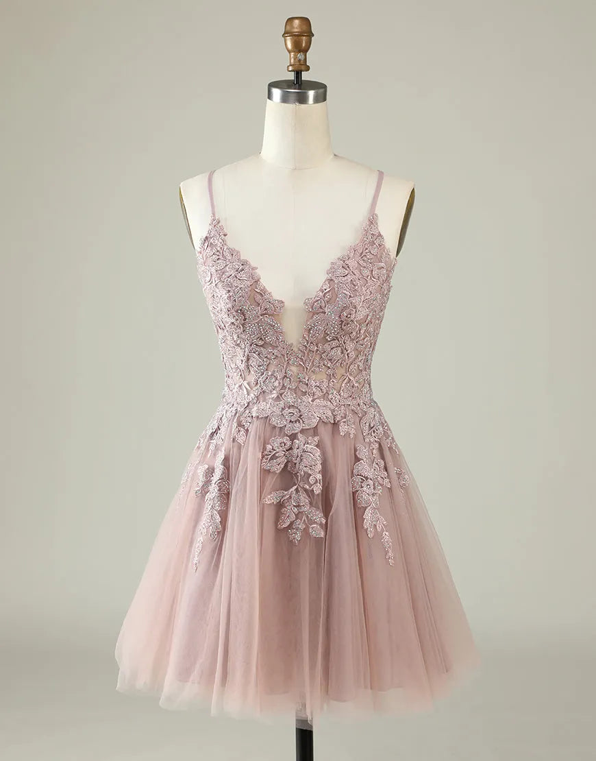 Elegant tulle mini dress with spaghetti straps and corset back, front view.