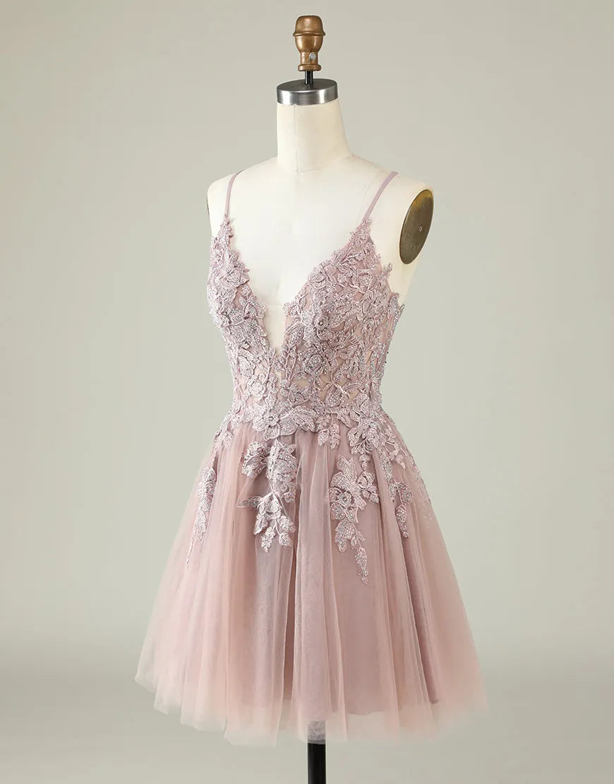 Side profile of the spaghetti strap tulle dress, showcasing its silhouette.