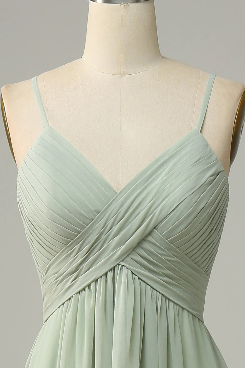 Back view of a graceful spaghetti strap bridesmaid gown.