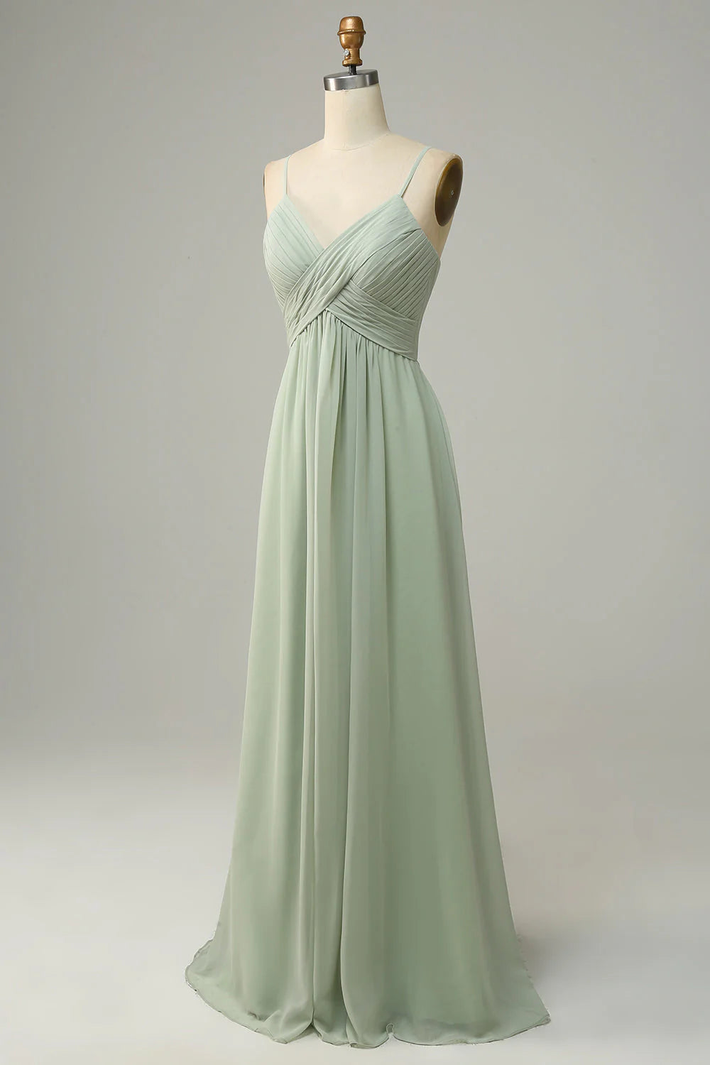 Close-up of the bodice and spaghetti straps on a bridesmaid dress.