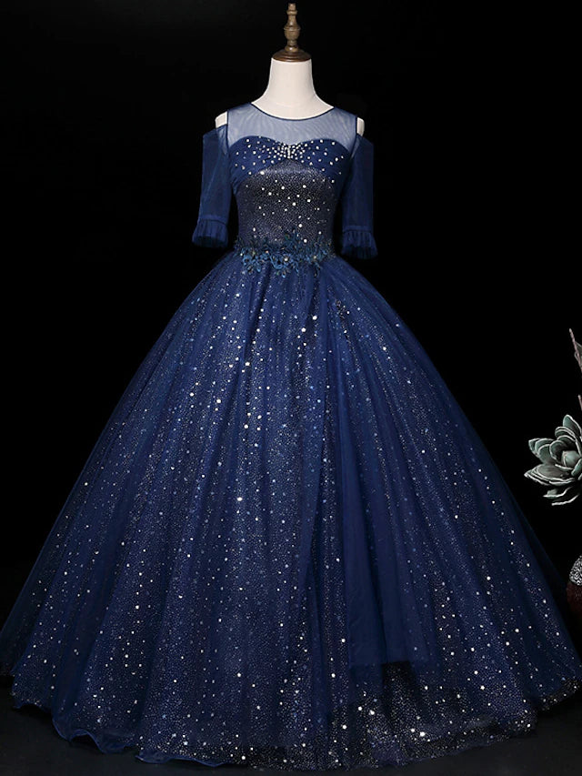Elegant sparkle ball gown with illusion neck and half sleeves.