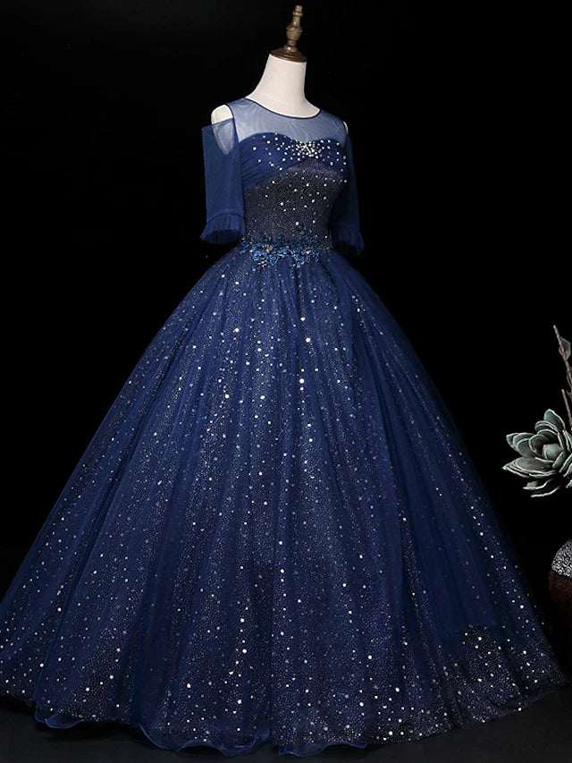 Back view of a floor-length sequin and tulle quinceanera dress.