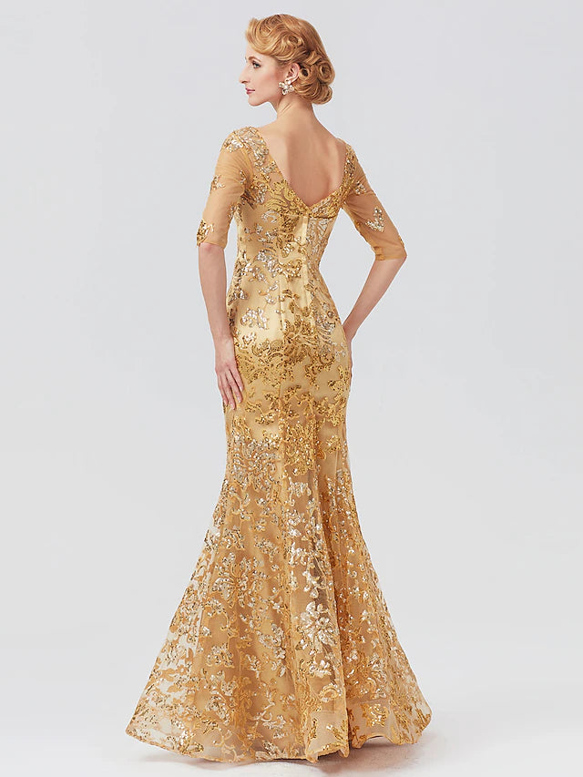 Close-up of the sequin and tulle fabric on the V-neck half sleeve gown.