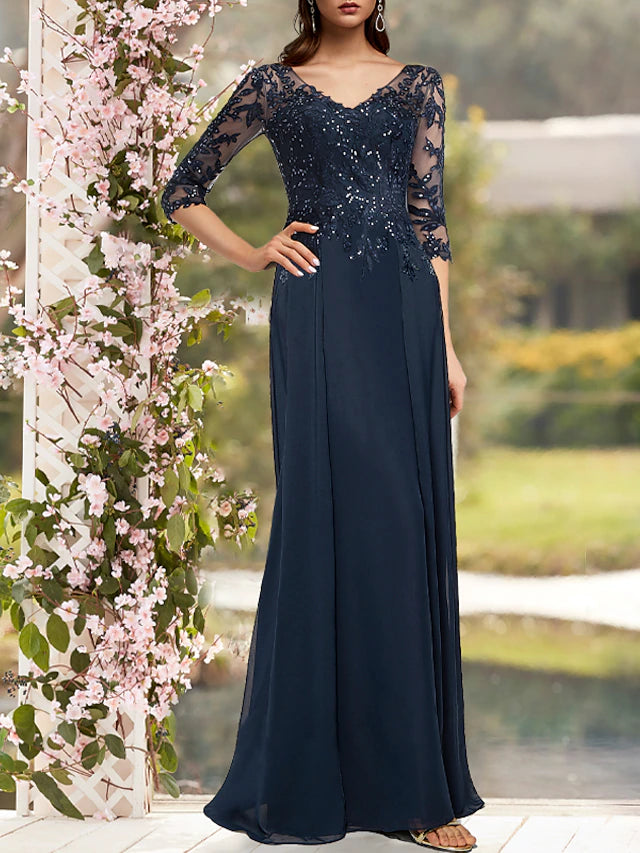Side view of sparkling V-neck sheath dress.