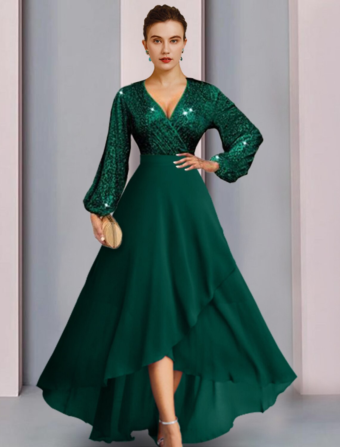 Woman wearing an elegant V-neck long sleeve sequined sheath dress.