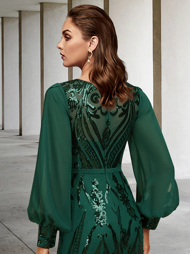 Back view of a formal chiffon mermaid dress with a sweep train.