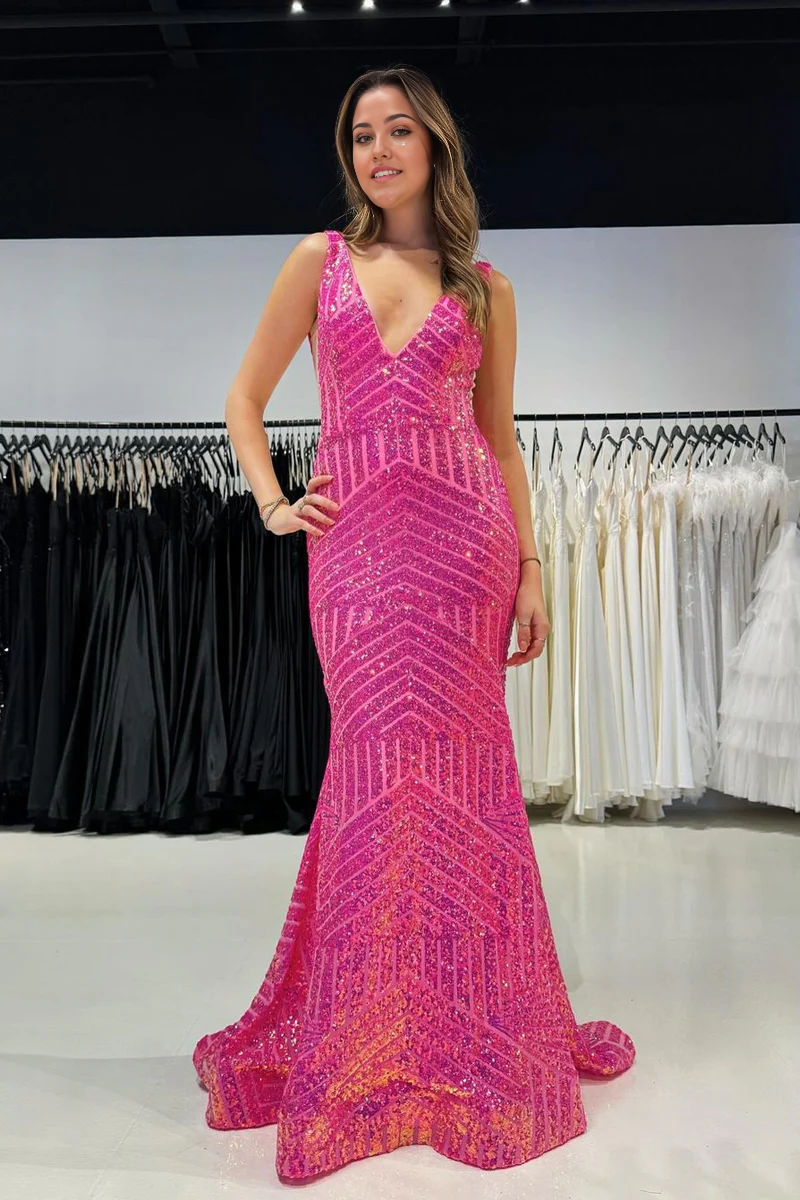Elegant pink sequined mermaid prom dress with a V-neckline.