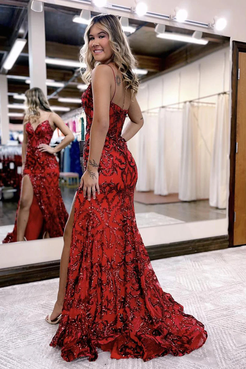 Back view of a sparkling mermaid V-neck sequin gown with a flowing train.