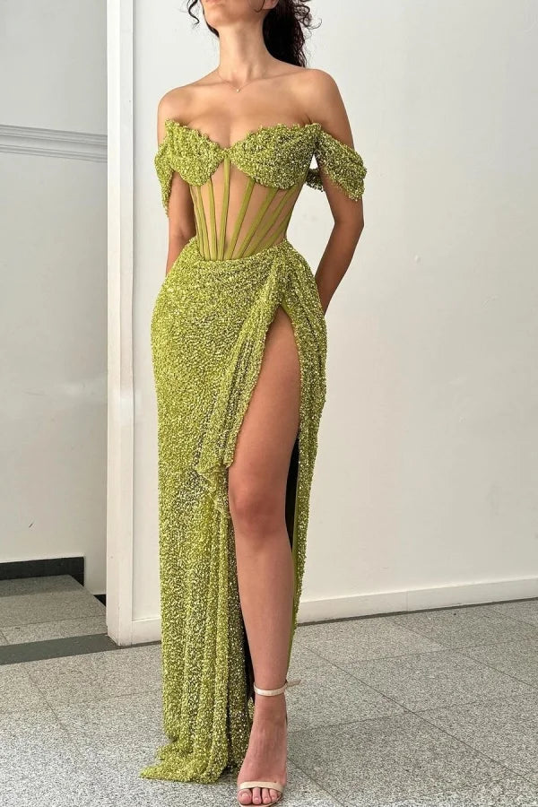 Long sparkling off-shoulder prom dress with a corset bodice.