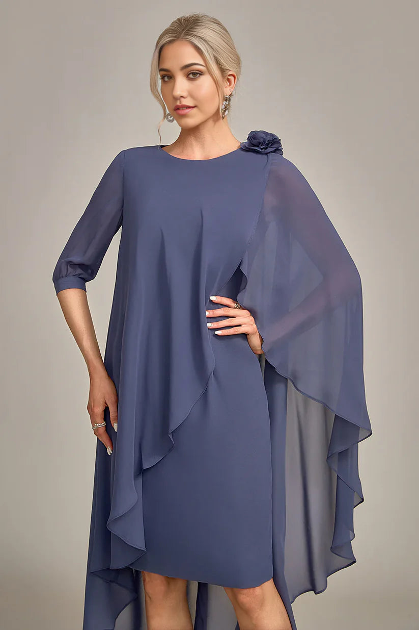Model wearing a V-neck knee-length mother of the bride dress.