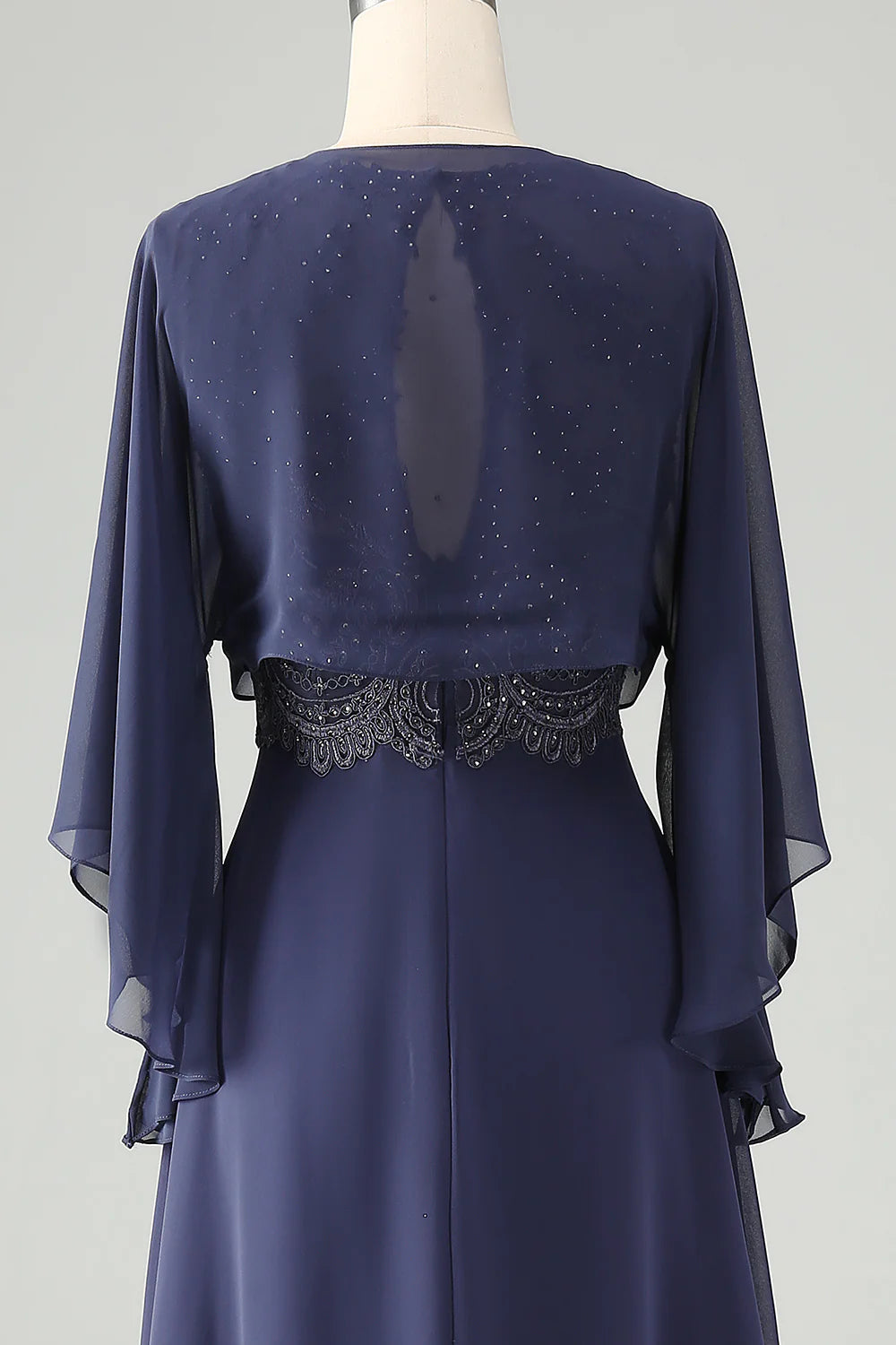 Back view of the A-line Mother of the Bride dress with flowing shawl.