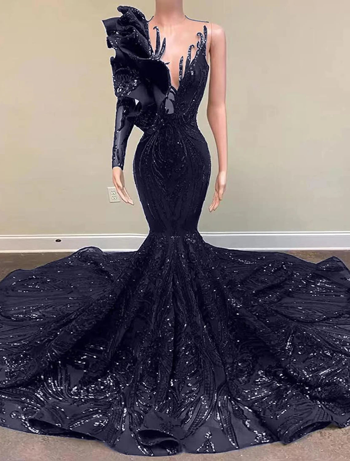 Full length view of the elegant one-shoulder sequined mermaid dress.