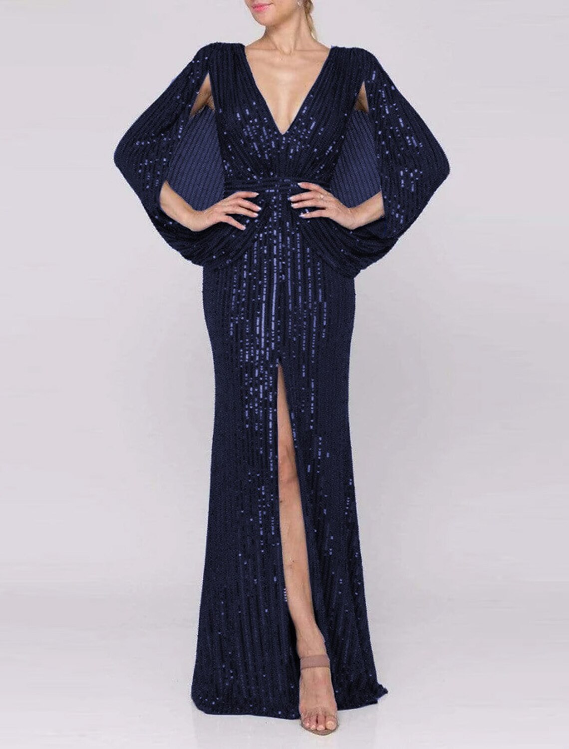 Elegant formal evening gown with capes and sweep train.