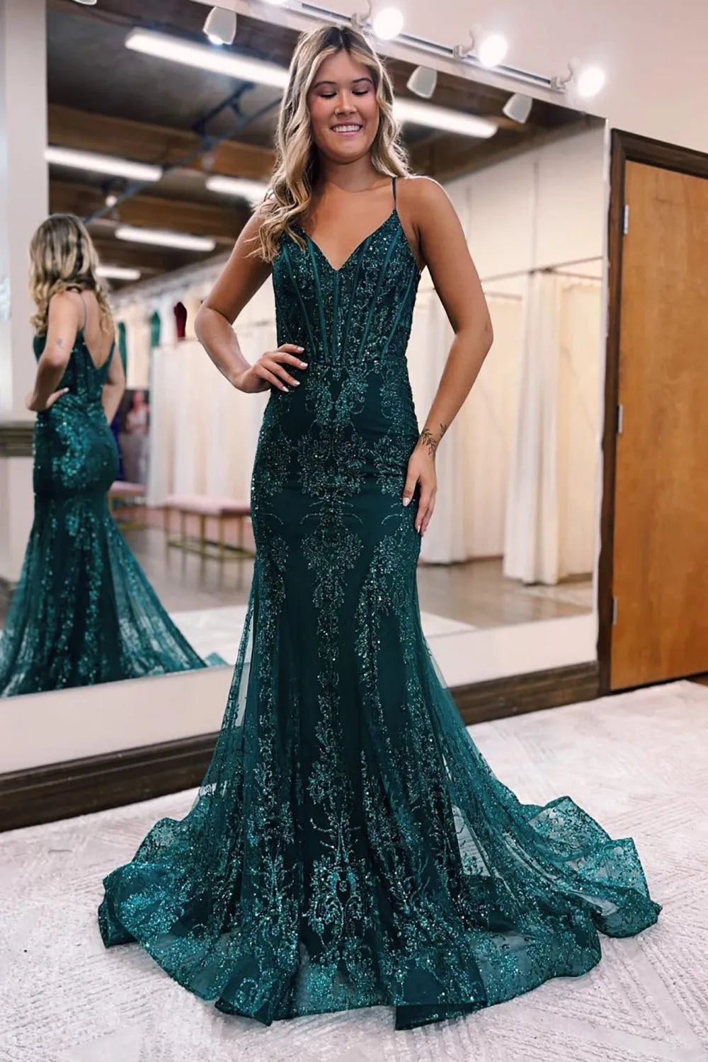 Elegant sparkly mermaid V-neck sequin long prom dress.