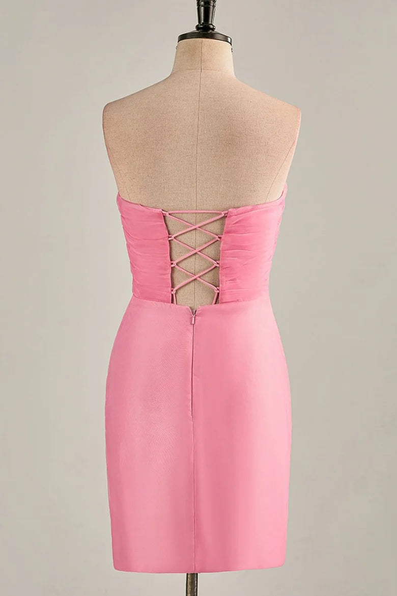 Model wearing a hot pink strapless chiffon homecoming dress.