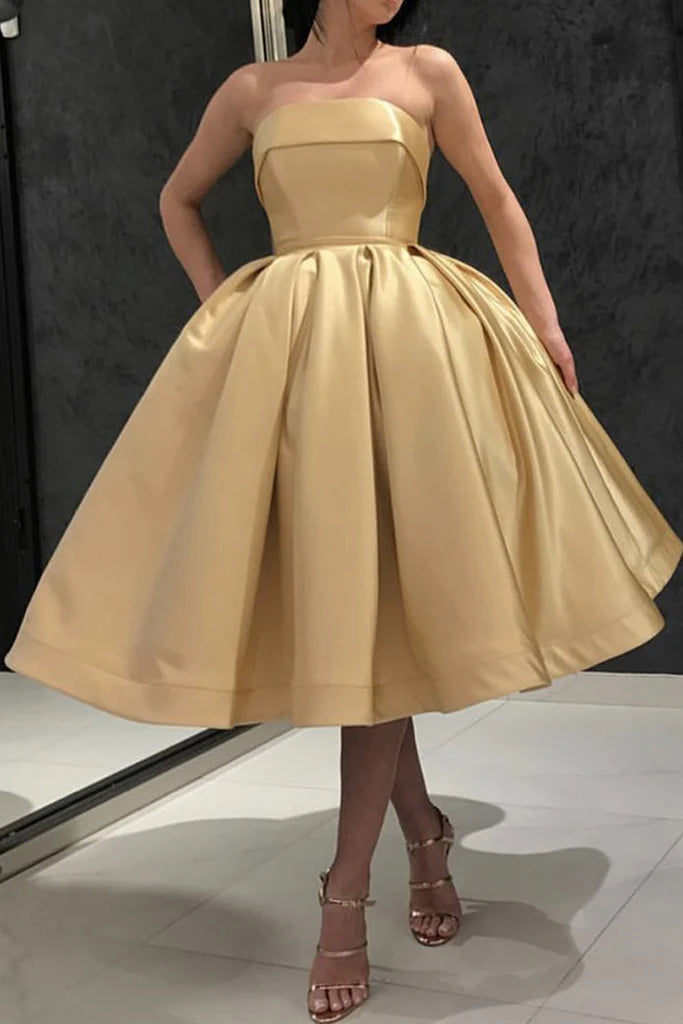 Full view of a strapless long dress for special occasions.