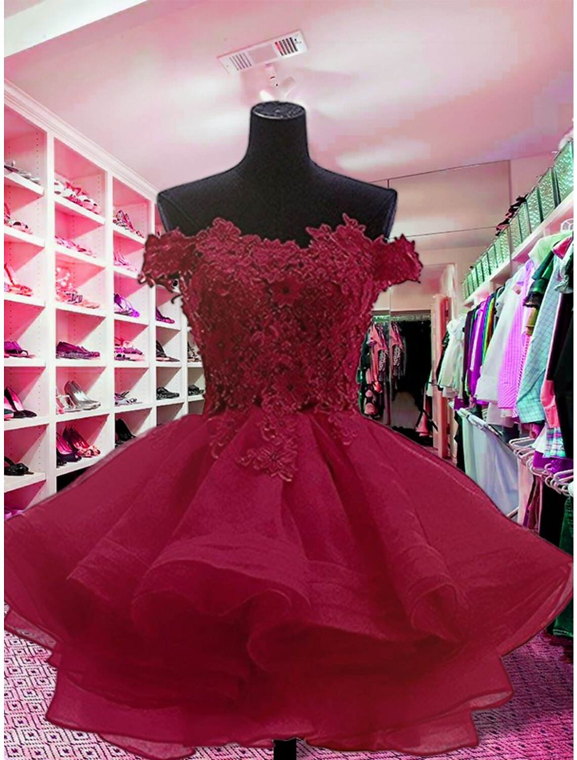 Back view of a short organza ball gown dress with delicate appliques.
