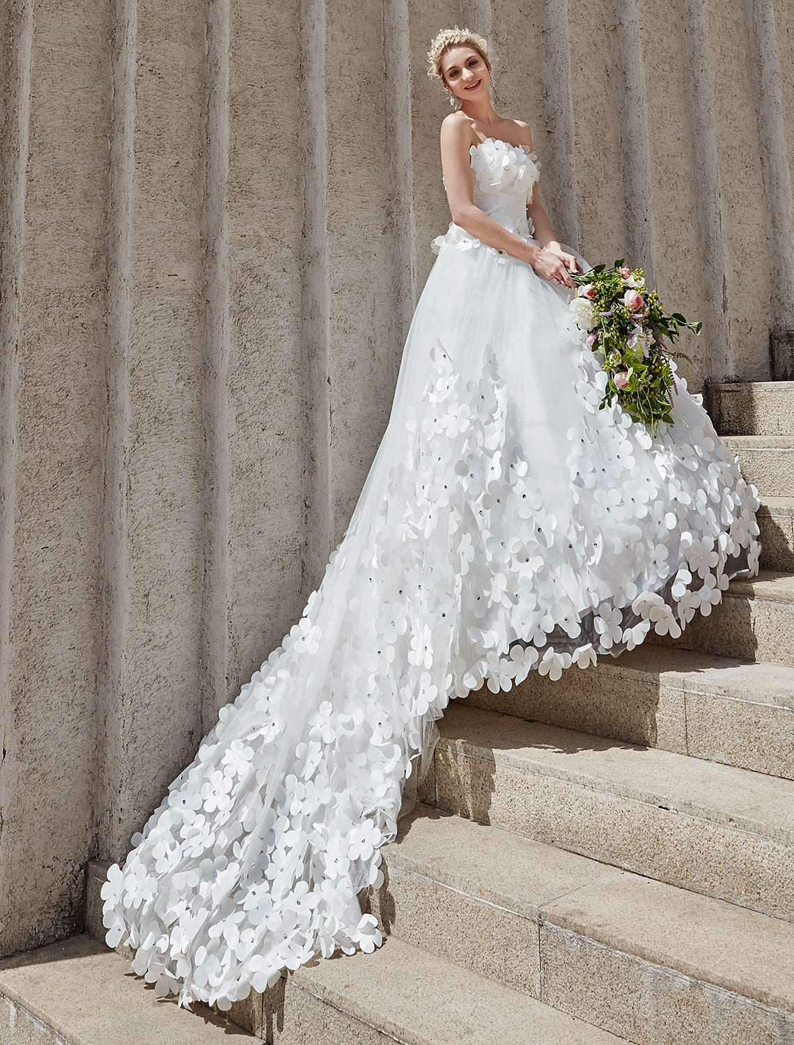 Wedding dress with intricate lace patterns and crystal accents.