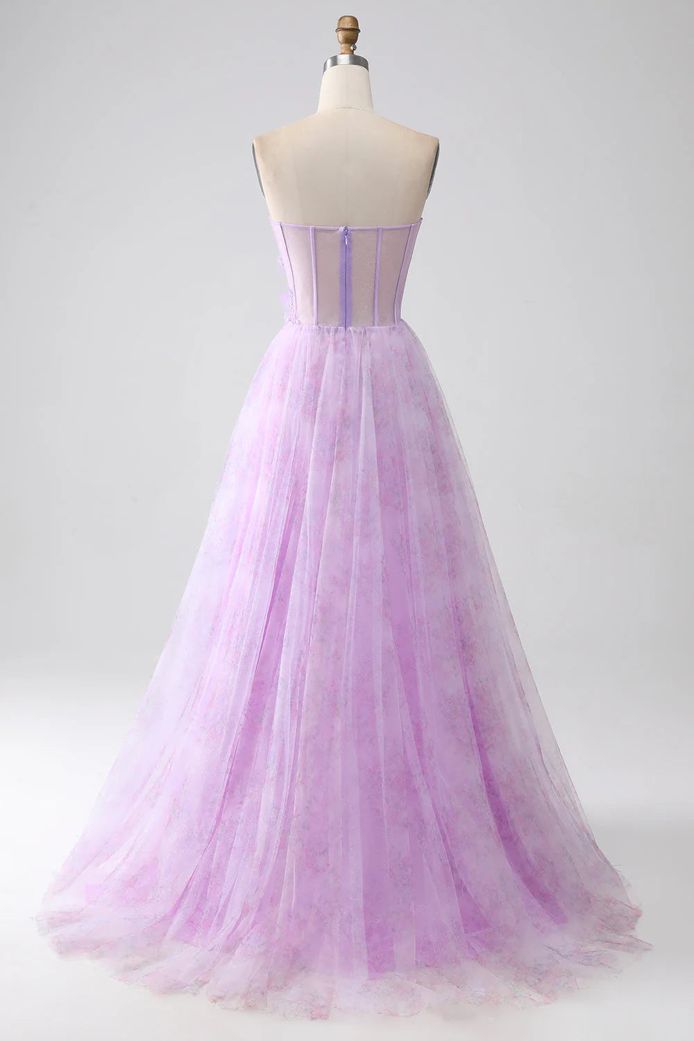 Back view of a purple strapless beaded prom dress.