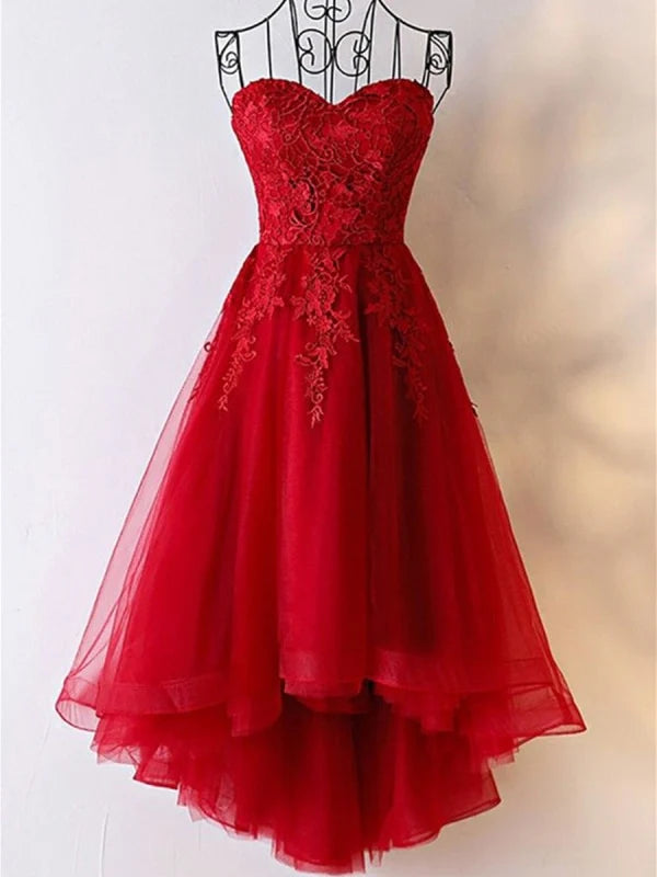 Elegant strapless lace and tulle maxi dress.