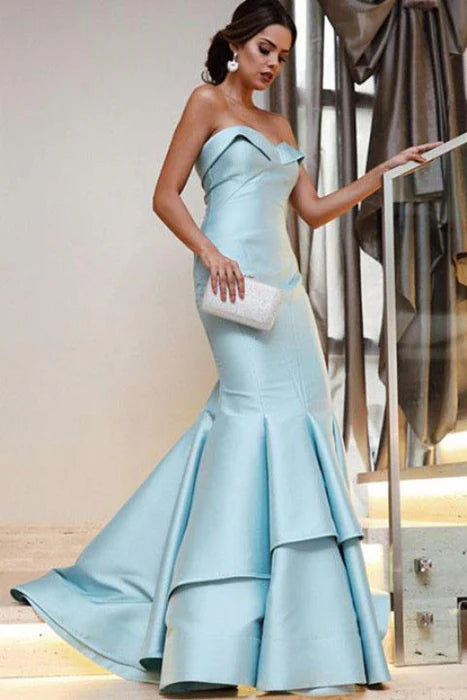 Elegant strapless mermaid prom dress with floor-length hem.