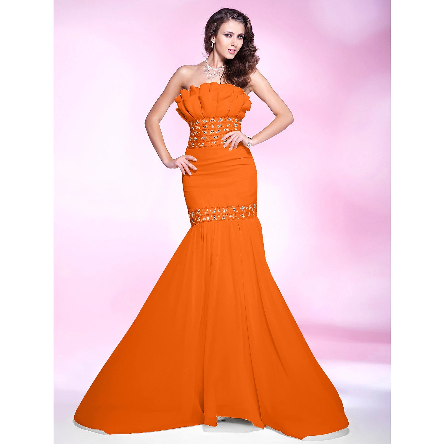 Back view of a strapless mermaid evening dress with sweep train.
