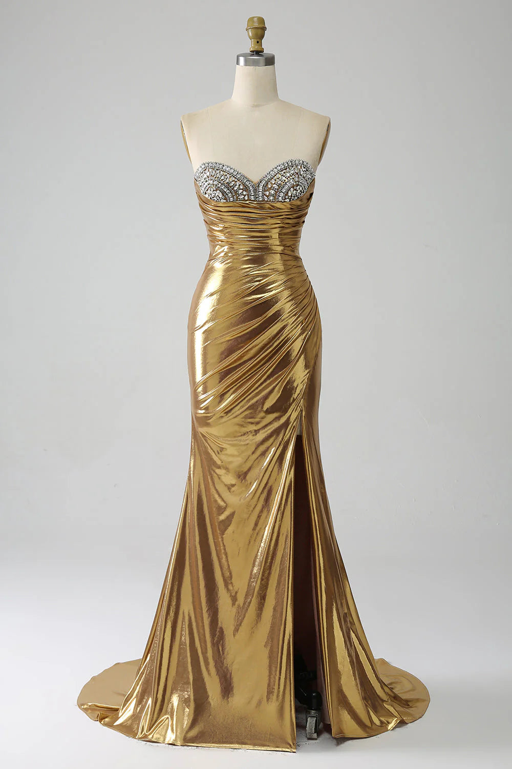 Elegant golden strapless mermaid prom dress with a high slit, front view.