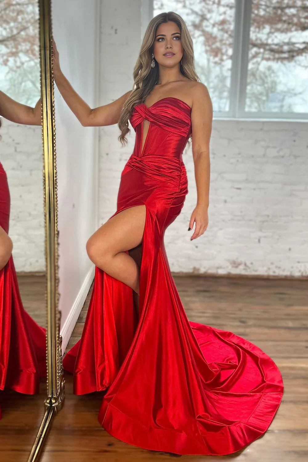 Close-up of the satin fabric and strapless neckline of the prom dress.
