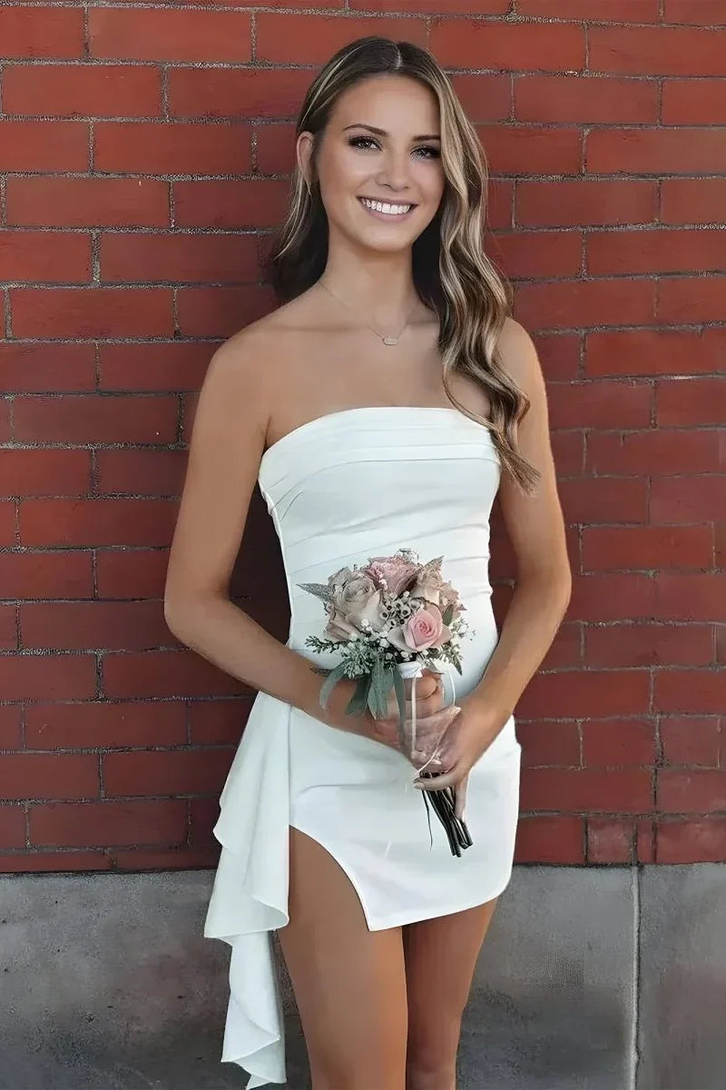 Close-up of the ruched detailing on a strapless bodycon dress.