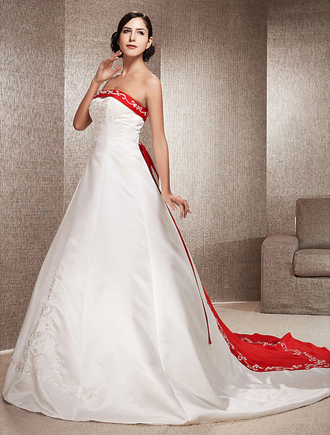 Full length view of the elegant strapless satin wedding dress.