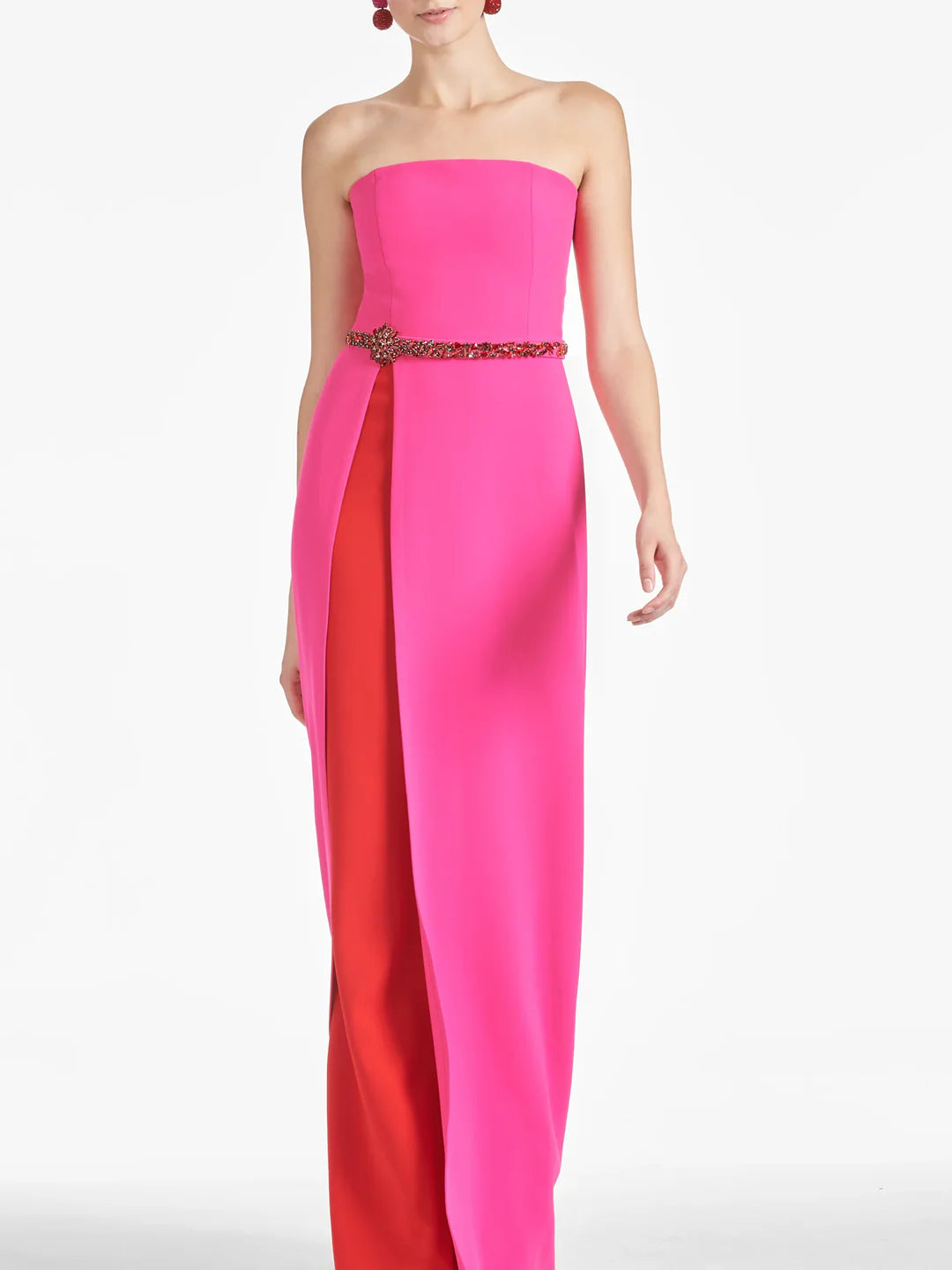 Side profile of a sophisticated floor length dress for formal occasions.