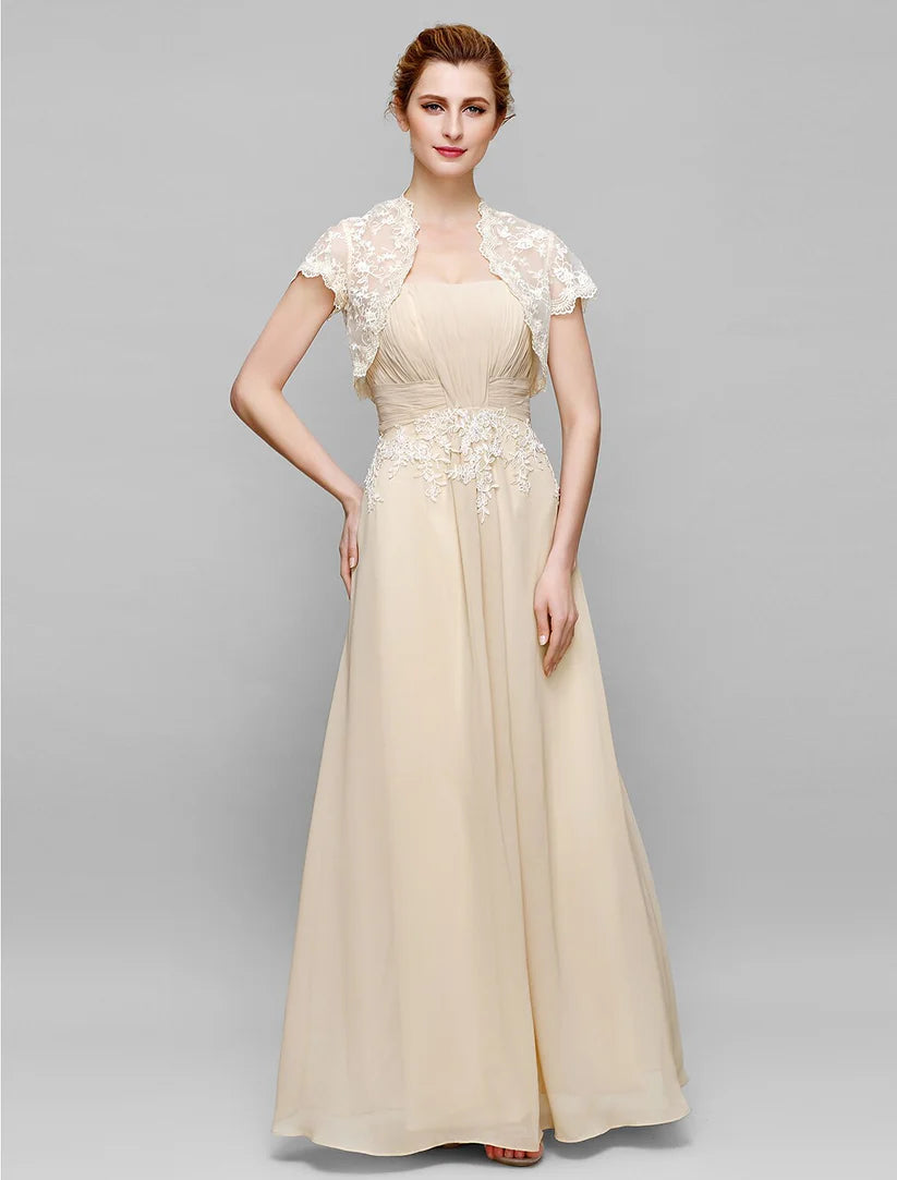 Woman wearing an elegant strapless ankle-length sheath Mother of the Bride dress in chiffon lace.