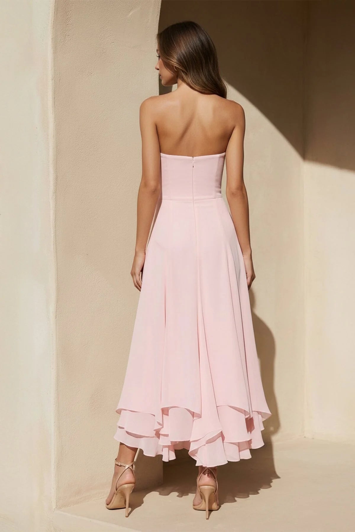 Back view of the flowing high-low chiffon formal dress.