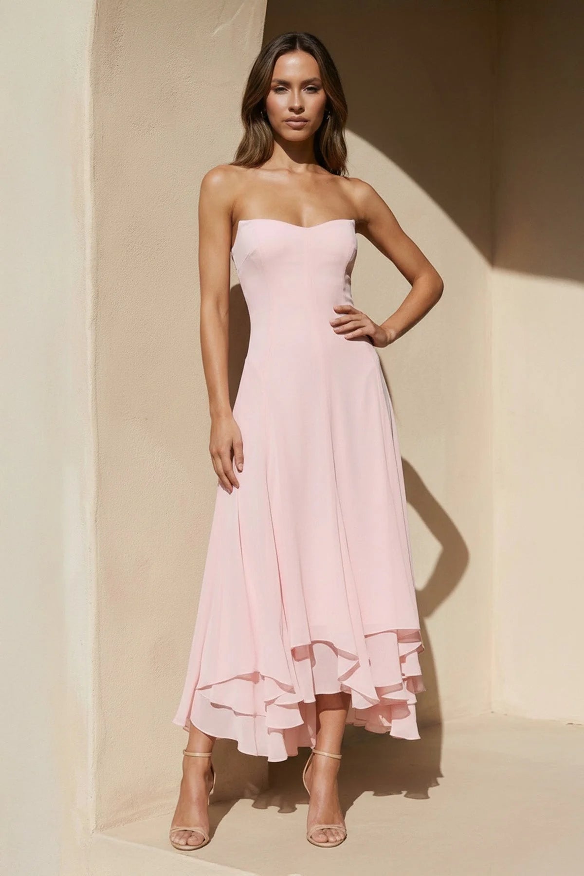 Close-up of the strapless sweetheart neckline and chiffon fabric.